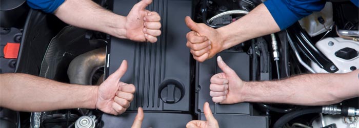 RM Automotive Inc. | technician thumbs up, auto repair, reseda, winnetka, scion, acura, honda